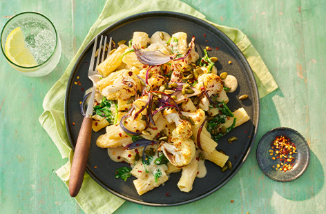 Whip up a creamy sauce using cauliflower, olive oil and pumpkin seeds that pairs perfectly with pasta. Use the leftovers to make our Summery chickpea stew for tomorrow's lunch.