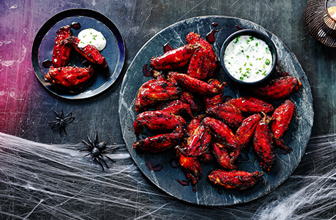 These sticky, spicy chicken wings will go down a treat at the Halloween party