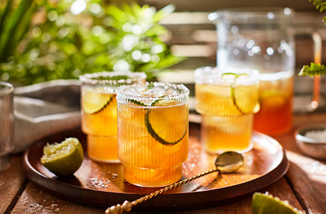 Turn beer into an instant refreshing slushie with this frozen lageritas recipe. Blitz together low-alcohol beer, non-alcoholic spirit, sugar and plenty of lime for an easy summer cocktail recipe, served in a pitcher.