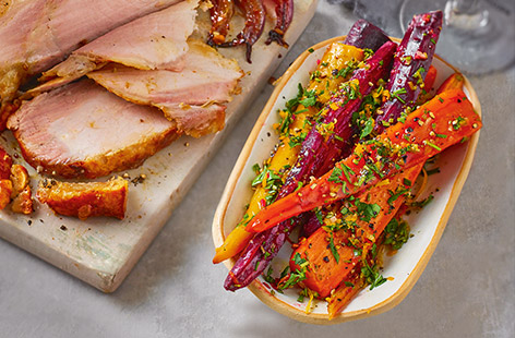 Upgrade your roast lunch sides with this citrus-sweet recipe using vibrant rainbow carrots, finished with a herby, zingy gremolata. Pretty to look at and packed with flavour, this is a real star side that you'll be making for every Sunday lunch!