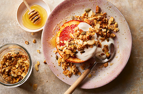 Upgrade your granola bowl with a citrus twist. Seasonal grapefruit juice mixed with honey and vanilla adds a lovely sweetness to the nuts and oats. It's a great topping for your morning yogurt or porridge. 