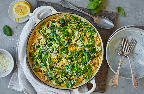 Add plenty of veg to your dinner plans with this green orzotto. Loaded with peas, green beans and spring greens, this clever twist on a risotto uses orzo instead of risotto rice for a quick spin on an Italian classic, ready in just over 30 mins.