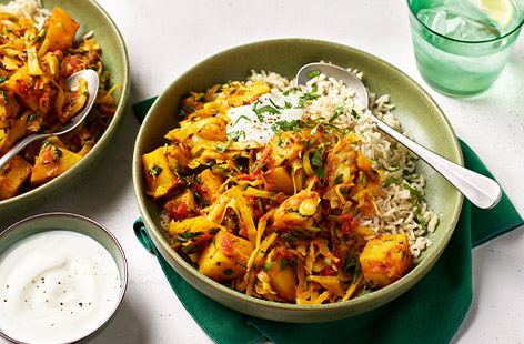 Potatoes and cabbage are gently spiced with cumin and turmeric to make this Gujarati-style curry. It takes just 25 minutes, plus it counts towards 2 of your 5-a-day - what's not to love? 