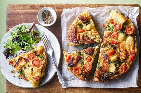 Halloumi and potatoes are baked with eggs and tomatoes to make this gorgeous, golden frittata. Try this as a delicious light dinner or lunch for those sunny springtime months.