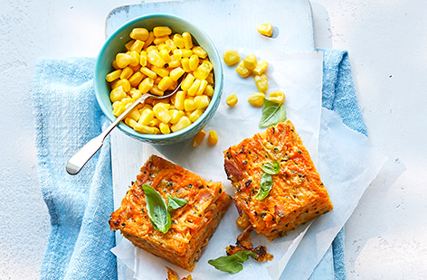 Inspired by crispy potato rosti, this ham and sweet potato slice makes a healthy lunch idea for kids during the holidays. Grated potatoes, ham, chives and melting cheese are combined into an easy bake – serve with sweetcorn for extra veg.