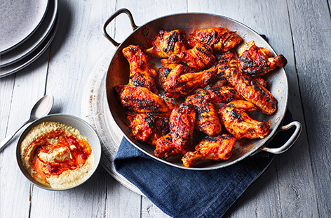 Dust off the tongs and light up the grill for these smoky and spicy harissa chicken wings