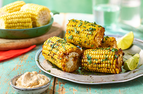 Golden cobettes get brought up a notch with a chipotle dip - a great side option for your next BBQ with friends and family