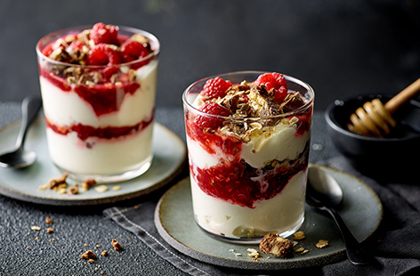 Layering whisky-infused cream, honey, oats, raspberries and chocolate honeycomb tiffin, these moreish individual cranachan are an indulgent twist on a classic Scottish dessert for your Burns Night supper