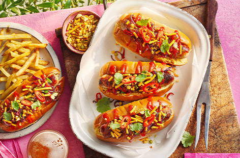 Take a barbecue must-have from basic to brilliant with this Indian-inspired take on the sausage in a bun.