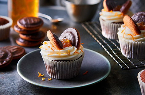 Get baking with the kids and make a batch of these easy Jaffa butterfly cupcakes. Fluffy chocolate orange cupcakes are topped with a swirl of vanilla buttercream and topped with a halved Jaffa cake for a chocolatey twist on a classic baking recipe.