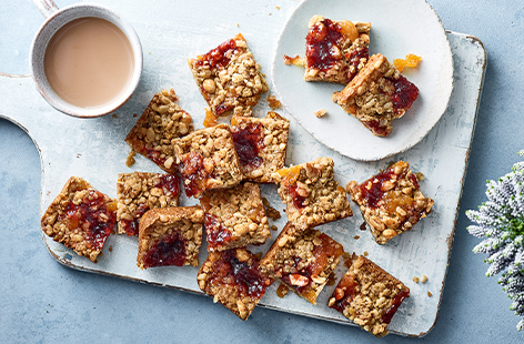 Bake yourself a grab-and-go treat with these peanut butter and jam flapjacks, filled with big flavours in every bite