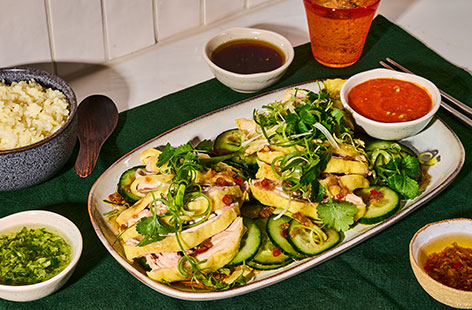 Justin’s recipe is a loving nod to his childhood holidays in Hong Kong, where he first discovered the flavours and techniques that make Hainanese chicken so special. Full of traditional cooking methods, he guides Greg and Seema through all the tips and tricks for achieving perfectly poached, tender chicken, served with a variety of delicious sauces and fragrant, chicken-flavoured rice. This is the real deal, brought to life in the Kitchen.
