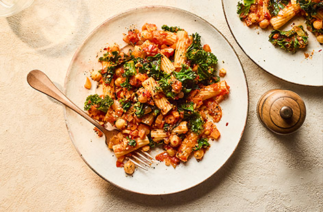 Grab some storecupboard ingredients and veggies to whizz up this super-tasty kale pasta dish that's simple and healthy. Curly kale adds an earthy, peppery kick, while the chickpeas add a buttery creaminess. If you don't need the dish to be dairy-free and veggie, you could always add some grated Parmesan to serve.