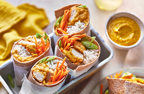 Chicken dippers are a clever shortcut here in these tasty katsu chicken burritos. The homemade sauce is easy to make and packs in some hidden veg, it freezes well too. The whole family will love these!