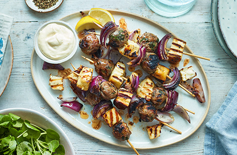The only thing better than fried halloumi is barbecued halloumi as these kebabs demonstrate: homemade lamb meatballs with garlic, mint, lemon zest and honey, skewered with the halloumi and chunks of red onion. A Greek holiday on a plate.