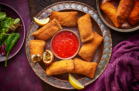 These minty lamb and pea rolls are crispy on the outside with a juicy, meat-filled centre