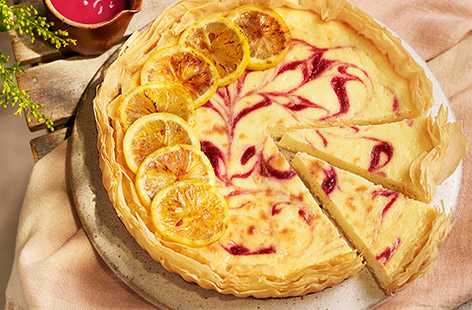 Make this zesty tart your go-to summer dessert. With a creamy lemon ricotta filling and a sweet raspberry swirl, it's sure to be a crowd-pleaser. 