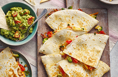 Quick to make and bursting with vibrant veg, these cheesy quesadillas will be loved by kids and adults alike