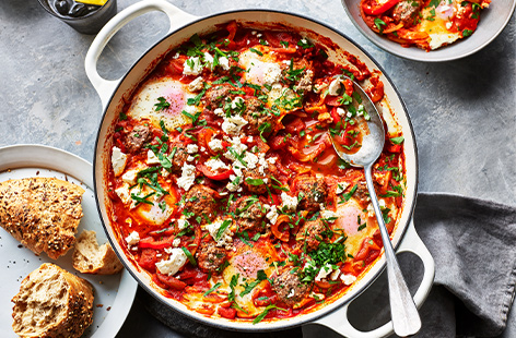 Pair a classic shakshuka – made with peppers and tomatoes – with meatballs to make this breakfast favourite into a wonderful weekend dinner.