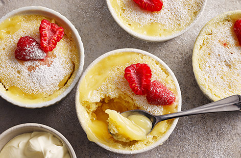 Craving something sweet? This zingy pud has a cheat’s lemon sauce and is ready in a flash. Plus, it's made entirely in the microwave!