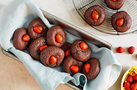 Easter baking couldn't be easier than this 2-ingredient mini egg chocolate orange thumbprint cookies recipe. A tube of triple chocolate cookie dough and a packet of mini eggs are all you need for a speedy Easter treat.