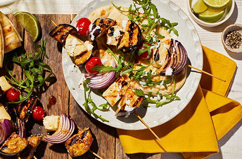These flavoursome kebabs feature a super-easy miso, soy and ginger dressing and interesting textures with smoky aubergine and charred halloumi. Fire up the barbecue for a delicious veggie main.