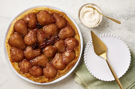 A twist on the classic tarte tatin, this pud is a real crowd pleaser – and will fill your kitchen with festive spice aromas before guests arrive – or serve to family and enjoy the leftovers! Using easy rough puff pastry and super-convenient tinned pears, this dessert is one to try.