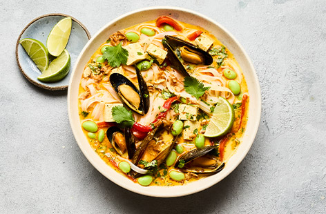 Spice up your midweek with this fresh and fragrant laksa that's on the table in just 20 minutes. Using a few cook's shortcuts, it's loaded with rich flavour and interesting texture. This is a spicy noodle soup you'll be making on repeat!