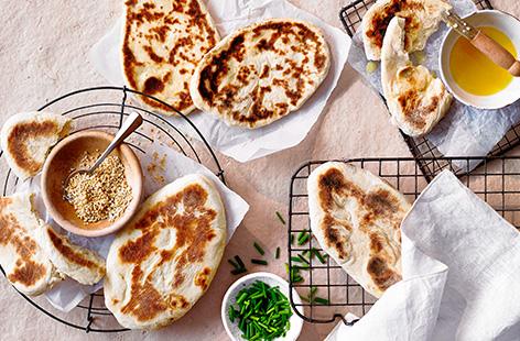 Fancy learning a new kitchen skill? Try our easy naan bread recipe for a simple introduction into making bread at home. These light and fluffy naans are easy to make and will give your next curry night a boost. 