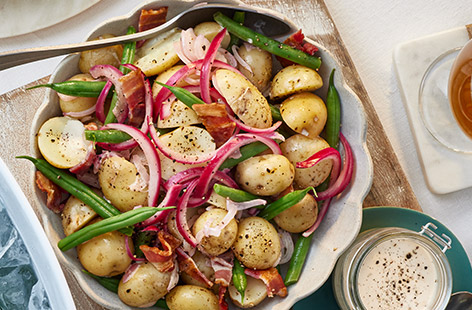 Seasonal spuds, green beans and crispy smoked bacon are combined with a mustard-mayo dressing in this delicious potato salad