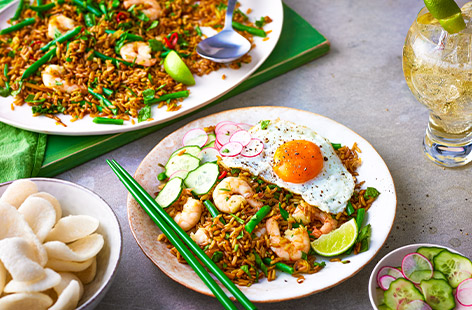 Prawns are the star of the show in this Indonesian fried rice fakeaway recipe, it comes topped with a fried egg and served with quick-pickled veggies