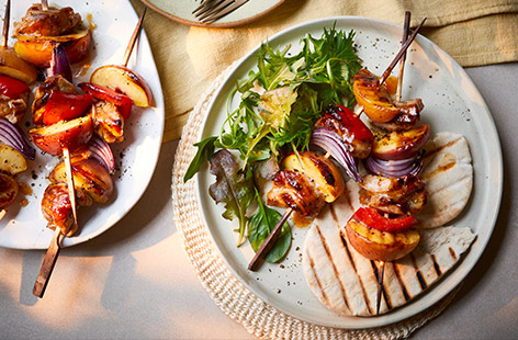 Adding peaches to these pork kebabs gives a beautiful caramelised flavour. Marinate the pork in advance, then all you have to do is heat the grill for a deliciously simple and healthy dinner.