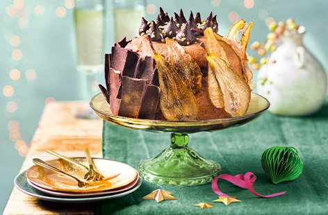 This store bought panettone is made extra-special with chocolate shards and gold-sprayed pears - festive showstoppers don't get much better than this!