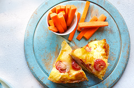 Treat the kids to pizza for lunch - but a whole lot healthier! Make this pizza omelettes recipe for an easy lunch idea for kids - simply top omelettes with melting mozzarella, cherry tomatoes and basil for a healthy lunch idea.