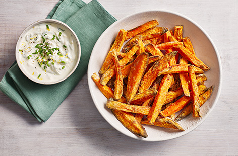The trick to restaurant-style sweet potatoes fries is to not cut them too thin and to not over-fill the basket when cooking. 