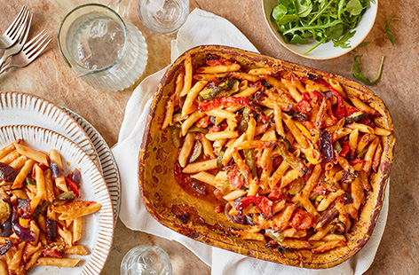 Add some extra veg to an easy pasta dinner with this ratatouille pasta bake recipe. Roast a medley of frozen Med veg with courgette, aubergine and peppers then add pasta and tinned tomatoes, top with cheese and bake until bubbling.