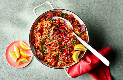 Jambalaya is a tasty fusion dish developed in Louisiana and inspired by African, Spanish and French cuisines. It makes a deliciously different family meal that's ready in just over half an hour. Our recipe uses leftover pepper, onion and passata from a pizza recipe, see tip, but you could easily fry up some fresh onions and peppers if you haven't made the pizzas.