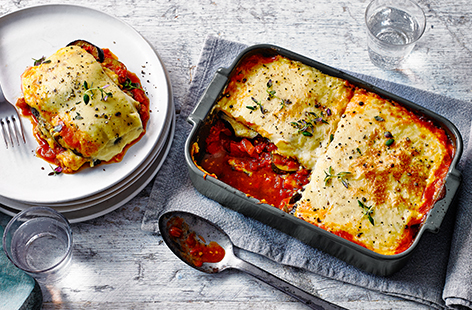 The classic comforting Greek dish has been given a vegetarian makeover in this hearty, healthy recipe that is suitable for vegans and uses peppers and courgettes instead of mince.