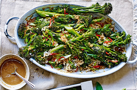 This vibrant, vegan-friendly salad sees tenderstem broccoli roasted with chilli, garlic and spring onions for a fragrant finish, tossed with wild rice, drizzled with an aromatic miso dressing and sprinkled with sesame seeds for crunch.