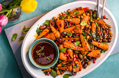 These roasted carrots are sure to be the star of the show at your Sunday roast. Gently spiced with cumin and topped with pomegranate seeds, this vibrant dish is a must-try all year round.