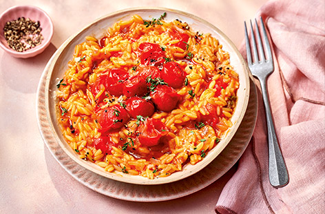 We've combined the best of both worlds in this creamy risotto-style orzo dish that stars garlicky, thyme-infused roasted tomatoes for a bold taste of the Med. This is a simple but deliciously different dinner you'll be making on repeat!