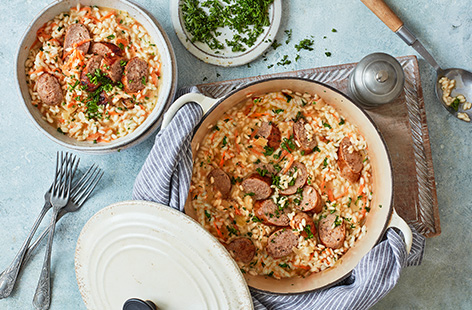 A little bit of stirring is worth it for this comforting carrot and sausage risotto. With grated carrot stirred through the rice for plenty of veg, plus crispy chunks of sausage and plenty of melting Cheddar cheese, this is comfort food in a bowl. 