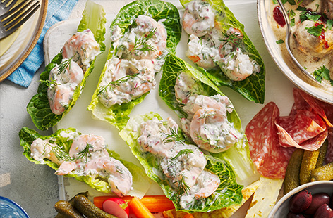 Build your own prawn-cocktail cup for a delicious retro starter that is perfect for a dinner party. The creamy filling is seasoned with fresh lemon zest and dill and takes only 10 minutes to arrange. 