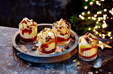 This sherry-caramel ice cream sundae recipe has a little bit of everything - creamy vanilla ice cream, toasted nuts, soft dates, crumbled shortbread and PX sherry swirled through caramel sauce. Layer up all the elements for an easy and indulgent Christmas dessert idea.
