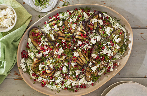 This delicious veggie aubergine dish is jam-packed with all the smoky flavours of the Lebanese dip, baba ganoush, and is finished with pomegranate seeds and reduced-fat salad cheese. It can be enjoyed as part of a barbecue spread or equally on its own with some salad