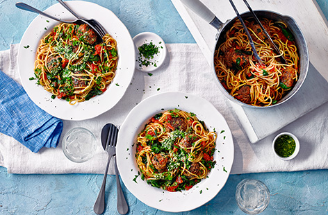 Pack veg into an Italian classic with this spinach and beef meatballs recipe. These tender meatballs are packed with spinach, carrot and onion for an easy way to get extra veg, then served with a classic tomato sauce, spaghetti and a drizzle of pesto.