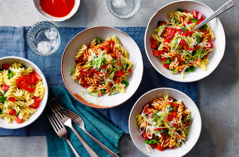 For a quick and easy meal, knock up this spanish pasta salad in under 20 minutes. With a garlic, paprika and lime juice dressing, and chopped crunchy peppers, juicy spring cherry tomatoes and spring onions, this lunch hits all the right notes.