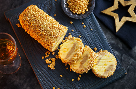 This sweet, spicy, and fragrant brandy butter is best when sliced into rounds and melted over warm mince pies