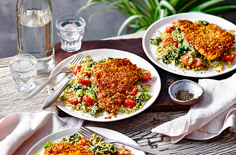 This spiced chicken escalope recipe gives a classic a new twist by adding a harissa coating underneath the crispy breadcrumbs. Serve with a colourful, veg-filled couscous salad for a 30 minute healthy recipe idea.