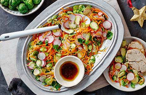 Bring a punch of colour to your dinnertime platter with this vibrant sprout, radish and carrot slaw